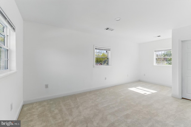 671 Pine Ridge Dr, Front Royal, VA 22630 - unfurnished room featuring carpet floors, visible vents, and a wealth of natural light