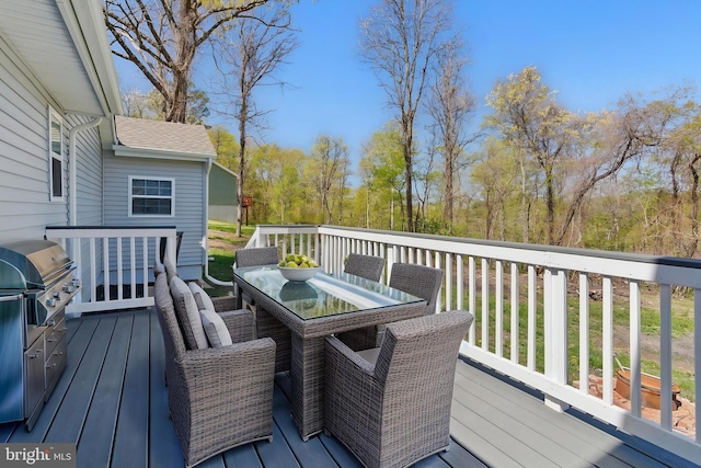 671 Pine Ridge Dr, Front Royal, VA 22630 - wooden deck featuring grilling area and outdoor dining space