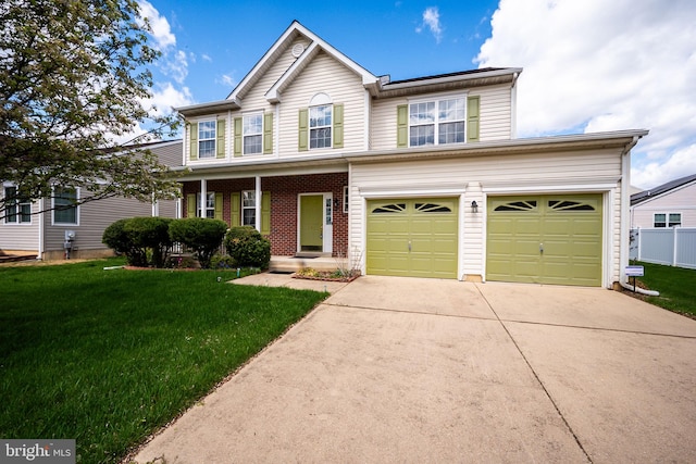 view of front facade with a garage, driveway, a front lawn, and fence