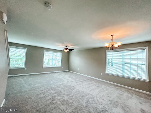 257 Morlatt Ln, Martinsburg, WV 25404 - carpeted spare room featuring a chandelier, baseboards, a ceiling fan, and a smoke detector