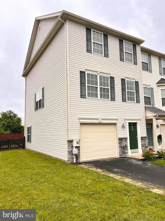 257 Morlatt Ln, Martinsburg, WV 25404 - view of front of house with driveway, an attached garage, and stone siding