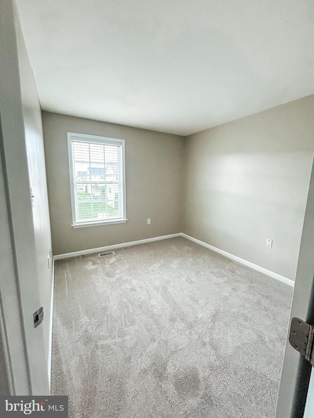257 Morlatt Ln, Martinsburg, WV 25404 - carpeted empty room with baseboards