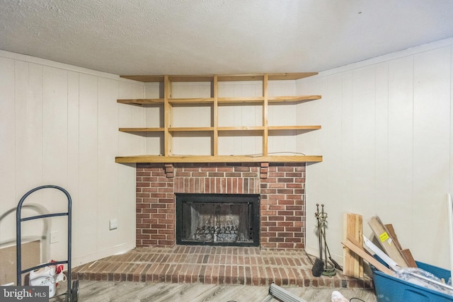 9427 Candleberry Ct, Burke, VA 22015 - living area with wood finished floors, baseboards, and a brick fireplace