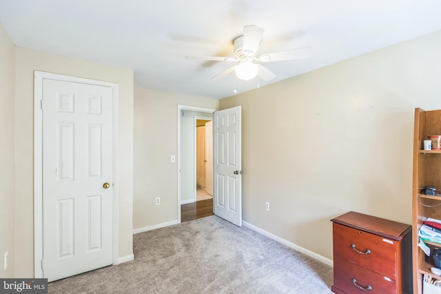 9427 Candleberry Ct, Burke, VA 22015 - unfurnished bedroom featuring baseboards, ceiling fan, and carpet
