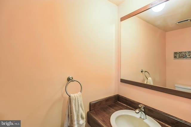 9427 Candleberry Ct, Burke, VA 22015 - half bathroom with toilet, visible vents, and vanity