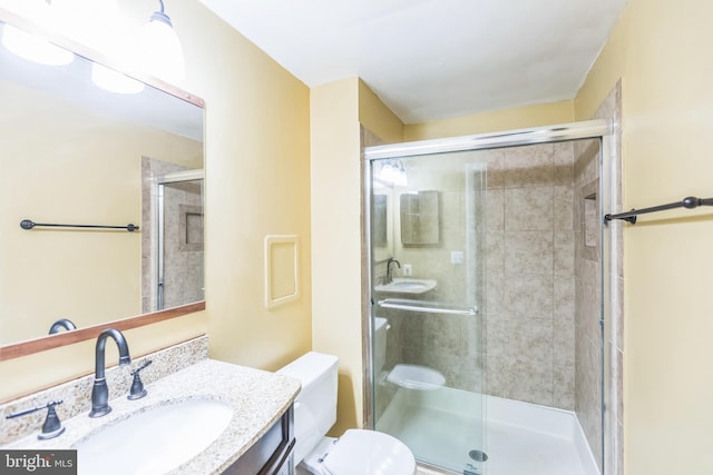 9427 Candleberry Ct, Burke, VA 22015 - bathroom featuring vanity, toilet, and a stall shower