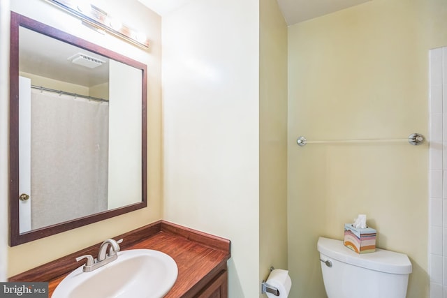 9427 Candleberry Ct, Burke, VA 22015 - full bathroom featuring visible vents, toilet, and vanity