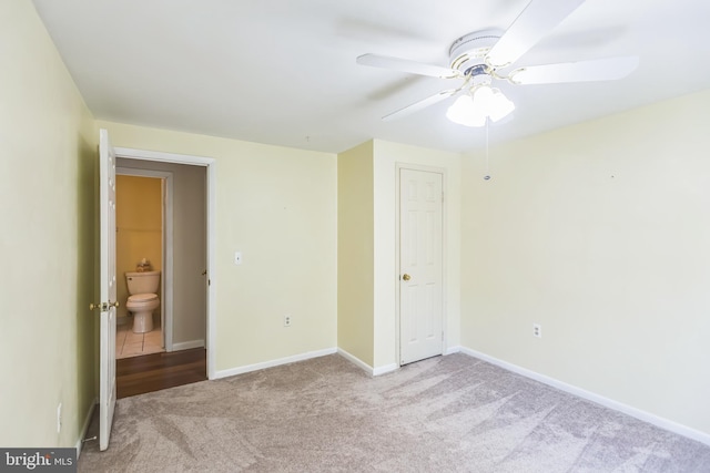 9427 Candleberry Ct, Burke, VA 22015 - unfurnished bedroom featuring baseboards, a ceiling fan, and carpet flooring