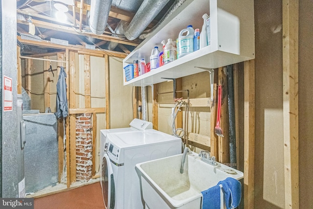 9427 Candleberry Ct, Burke, VA 22015 - laundry area with independent washer and dryer and a sink