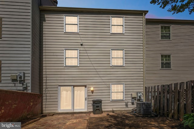 9427 Candleberry Ct, Burke, VA 22015 - rear view of house with cooling unit, a patio, and fence