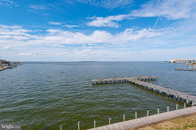 exterior space with a water view