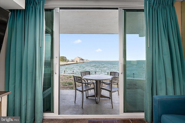 doorway featuring a water view