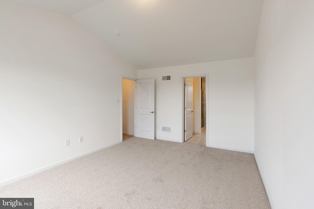 2685 Victorian Dr Lot 67, Dover, PA 17315 - unfurnished bedroom with light carpet, lofted ceiling, visible vents, and baseboards