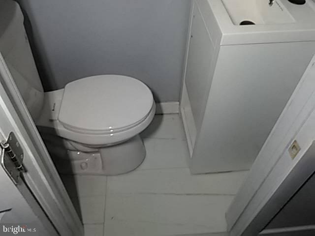 bathroom featuring toilet
