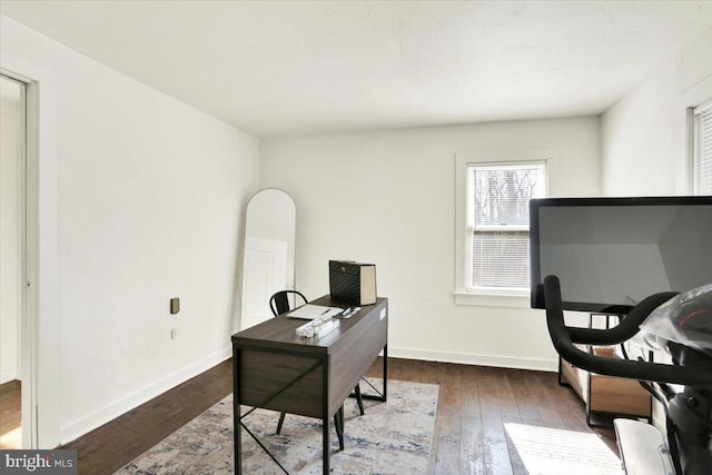 office with baseboards and wood-type flooring