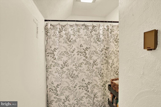 details with curtained shower