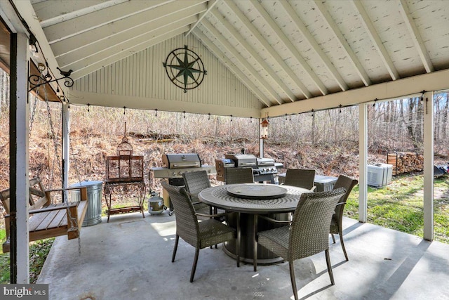 view of patio / terrace with central air condition unit and outdoor dining space