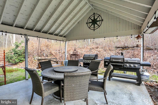 view of patio / terrace with grilling area and outdoor dining area