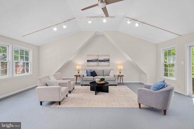 1517 Snughill Ct, Vienna, VA 22182 - living area featuring track lighting, healthy amount of natural light, vaulted ceiling, ceiling fan, and baseboards