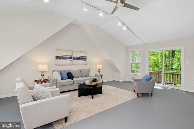 1517 Snughill Ct, Vienna, VA 22182 - living area featuring concrete flooring, track lighting, vaulted ceiling, baseboards, and a ceiling fan