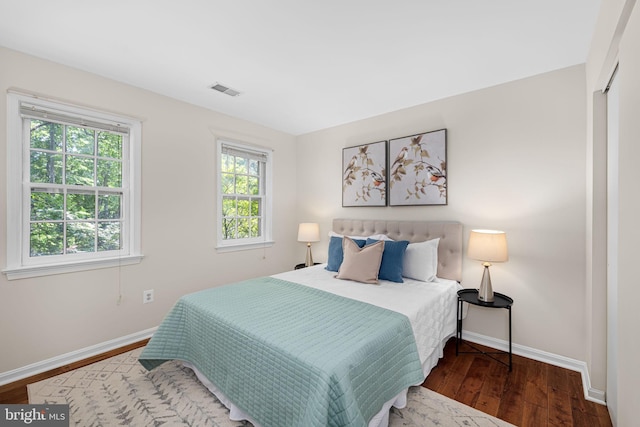 1517 Snughill Ct, Vienna, VA 22182 - bedroom featuring baseboards and wood finished floors