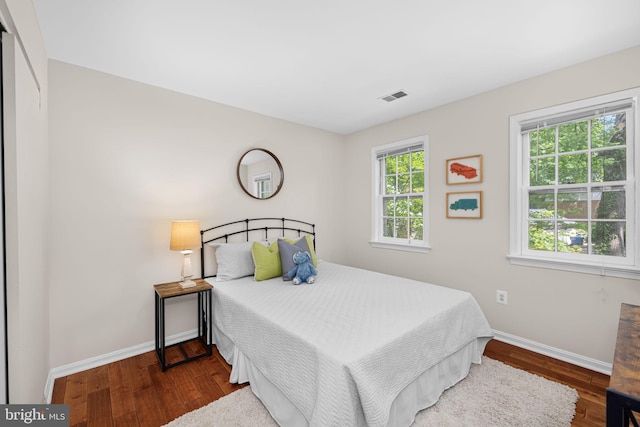 1517 Snughill Ct, Vienna, VA 22182 - bedroom featuring baseboards and wood finished floors