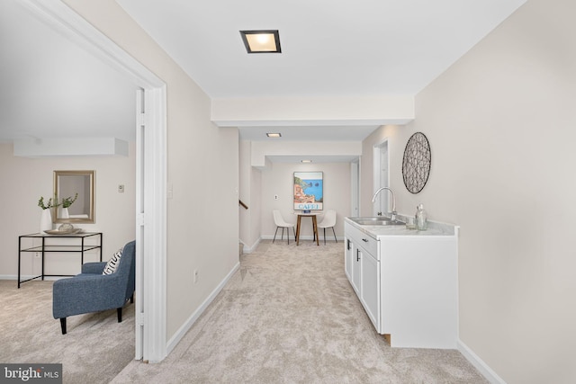 1517 Snughill Ct, Vienna, VA 22182 - corridor featuring a sink, light colored carpet, and baseboards