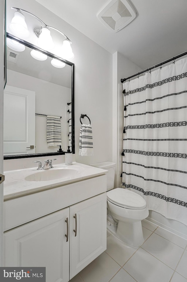 full bathroom featuring tile patterned floors, vanity, toilet, and a shower with curtain