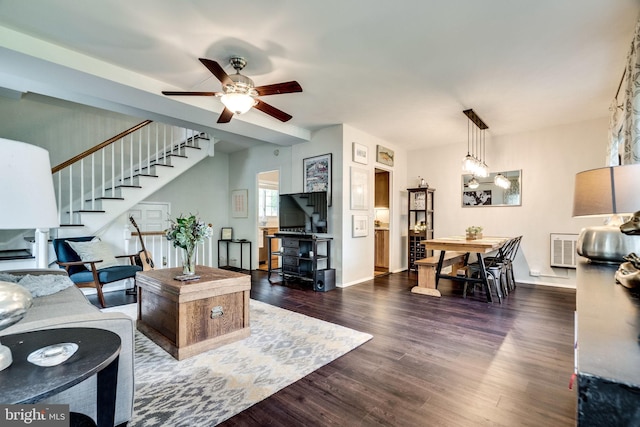 1608 Preston Rd, Alexandria, VA 22302 - living room with stairway, ceiling fan, baseboards, and wood finished floors