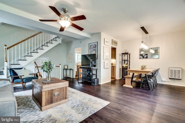 1608 Preston Rd, Alexandria, VA 22302 - living room featuring baseboards, heating unit, a ceiling fan, wood finished floors, and stairs