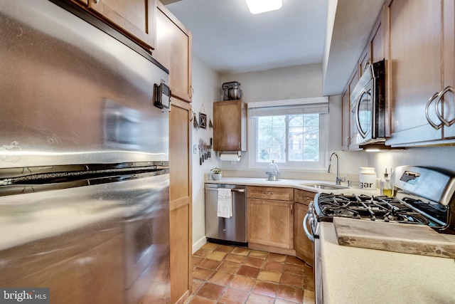 1608 Preston Rd, Alexandria, VA 22302 - kitchen featuring appliances with stainless steel finishes, a sink, and light countertops