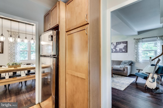 1608 Preston Rd, Alexandria, VA 22302 - kitchen with freestanding refrigerator, wood finished floors, a healthy amount of sunlight, and pendant lighting