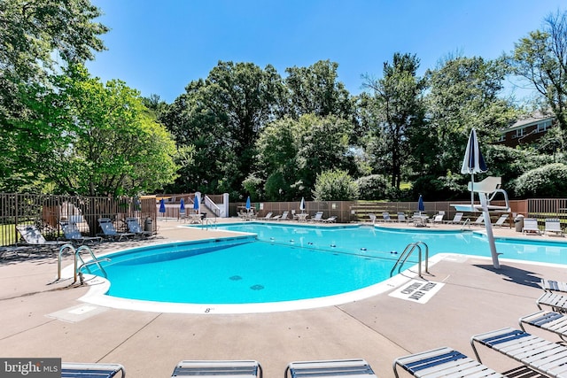 1608 Preston Rd, Alexandria, VA 22302 - community pool with a patio and fence