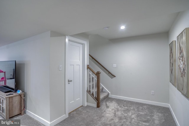 staircase with carpet and baseboards