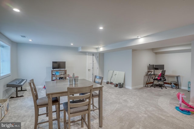 carpeted dining room with baseboards, visible vents, and recessed lighting