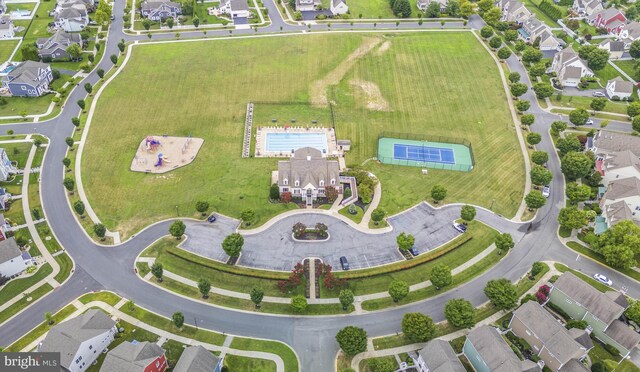 birds eye view of property with a residential view