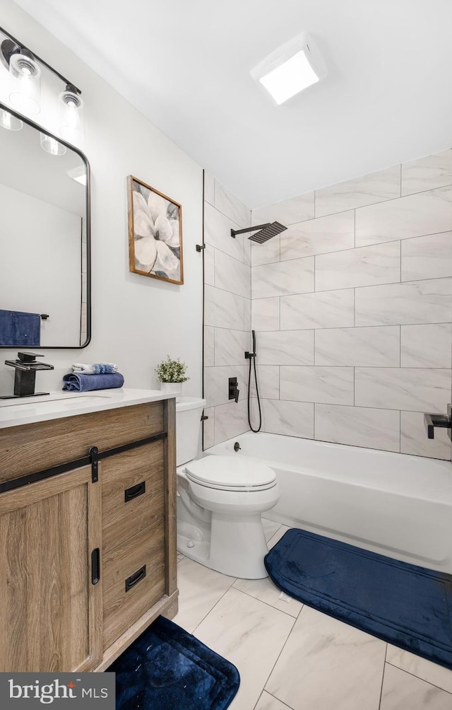 full bath featuring marble finish floor, shower / bathtub combination, toilet, and vanity