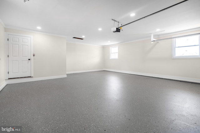 garage featuring baseboards, recessed lighting, and a garage door opener
