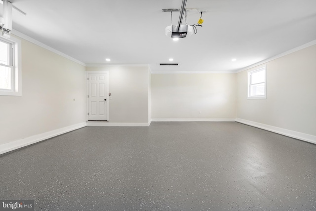 garage with baseboards, visible vents, and recessed lighting