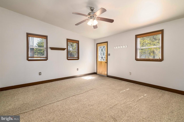 610 Washington Ln, Jenkintown, PA 19046 - empty room with lofted ceiling, a ceiling fan, baseboards, and light carpet