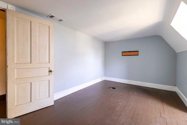 610 Washington Ln, Jenkintown, PA 19046 - bonus room featuring lofted ceiling, baseboards, visible vents, and dark wood finished floors