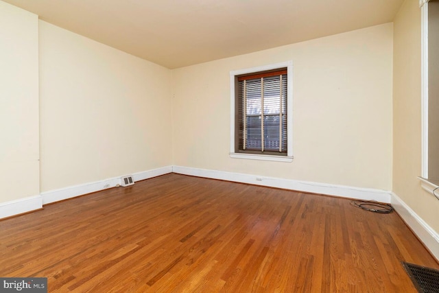 610 Washington Ln, Jenkintown, PA 19046 - unfurnished room featuring wood finished floors, visible vents, and baseboards