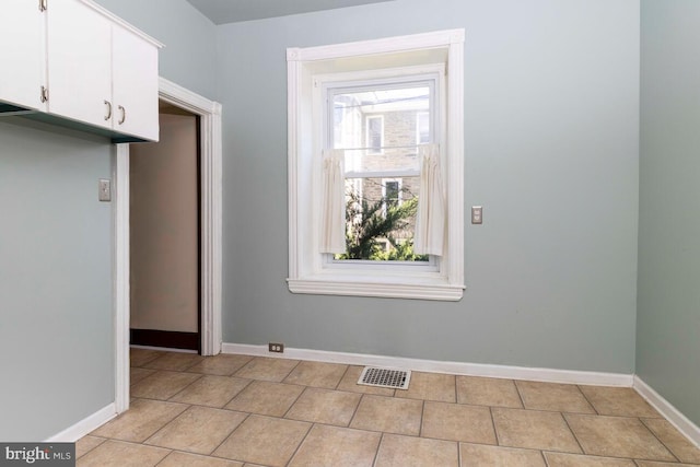 610 Washington Ln, Jenkintown, PA 19046 - interior space featuring light tile patterned floors, baseboards, visible vents, and plenty of natural light
