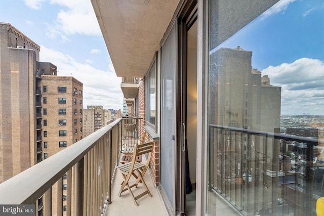 balcony featuring a city view