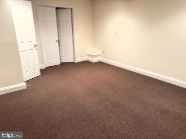 11258 Wildmeadows St, Waldorf, MD 20601 - unfurnished bedroom with baseboards and dark carpet