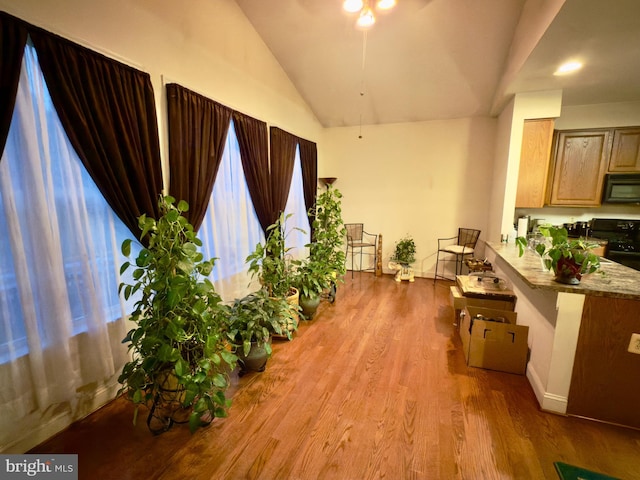 11258 Wildmeadows St, Waldorf, MD 20601 - living area with wood finished floors and lofted ceiling