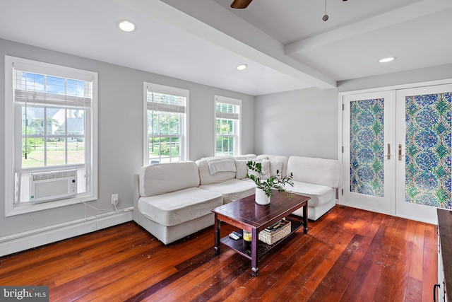 living area with cooling unit, recessed lighting, and hardwood / wood-style floors