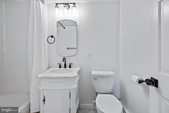 full bath featuring baseboards, vanity, toilet, and shower / tub combo