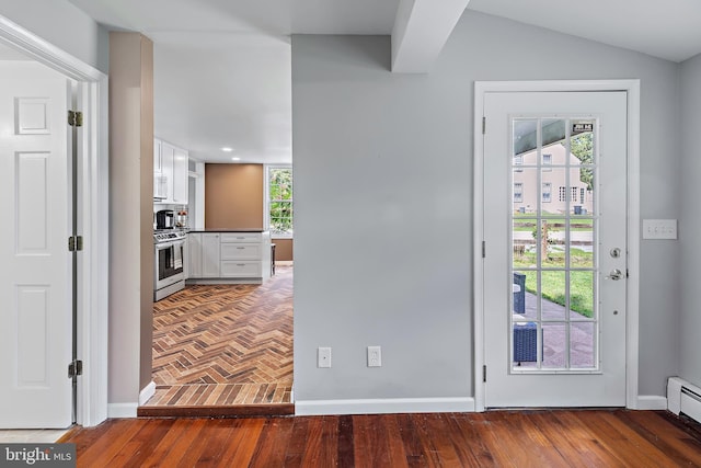 interior space with baseboards, recessed lighting, and wood finished floors