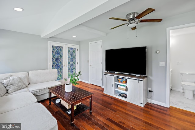 living area featuring recessed lighting, baseboards, and dark wood-style floors